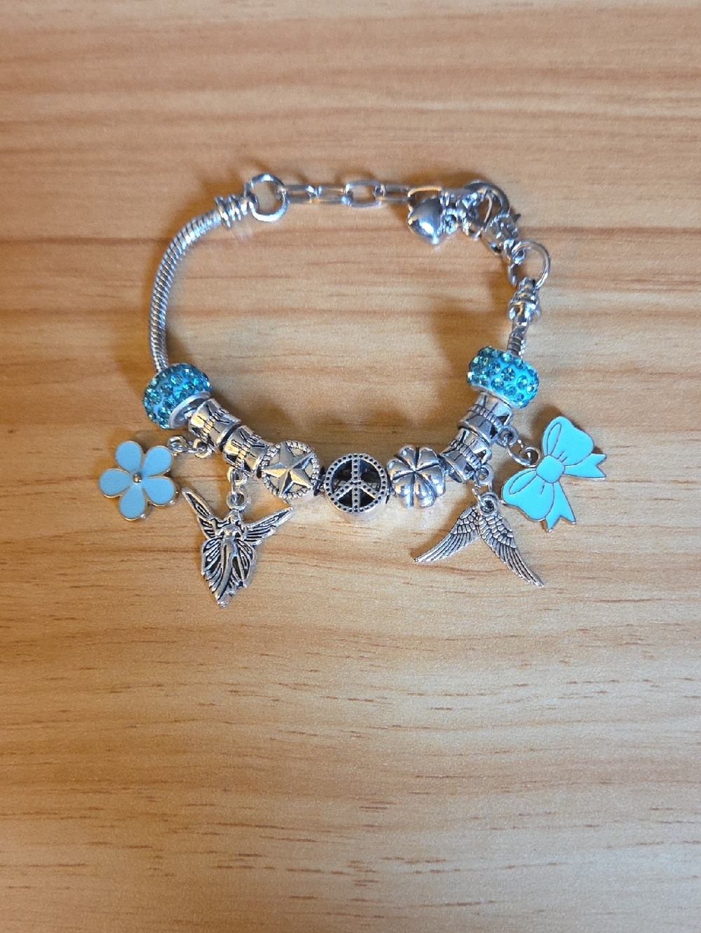 Silver-Tone Charm Bracelet with Aqua Blue Flower & Bow Accents